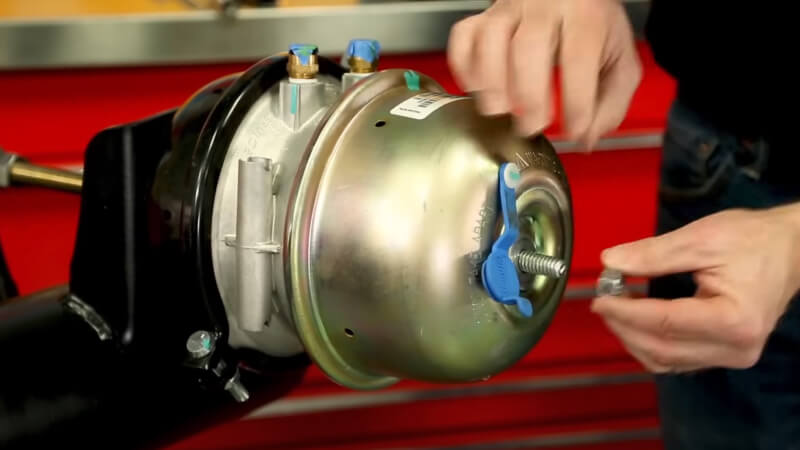 man intalling washer nut