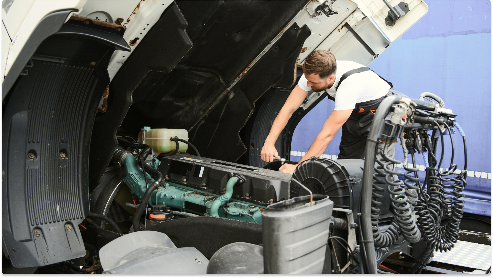 mechanic working on vehicle